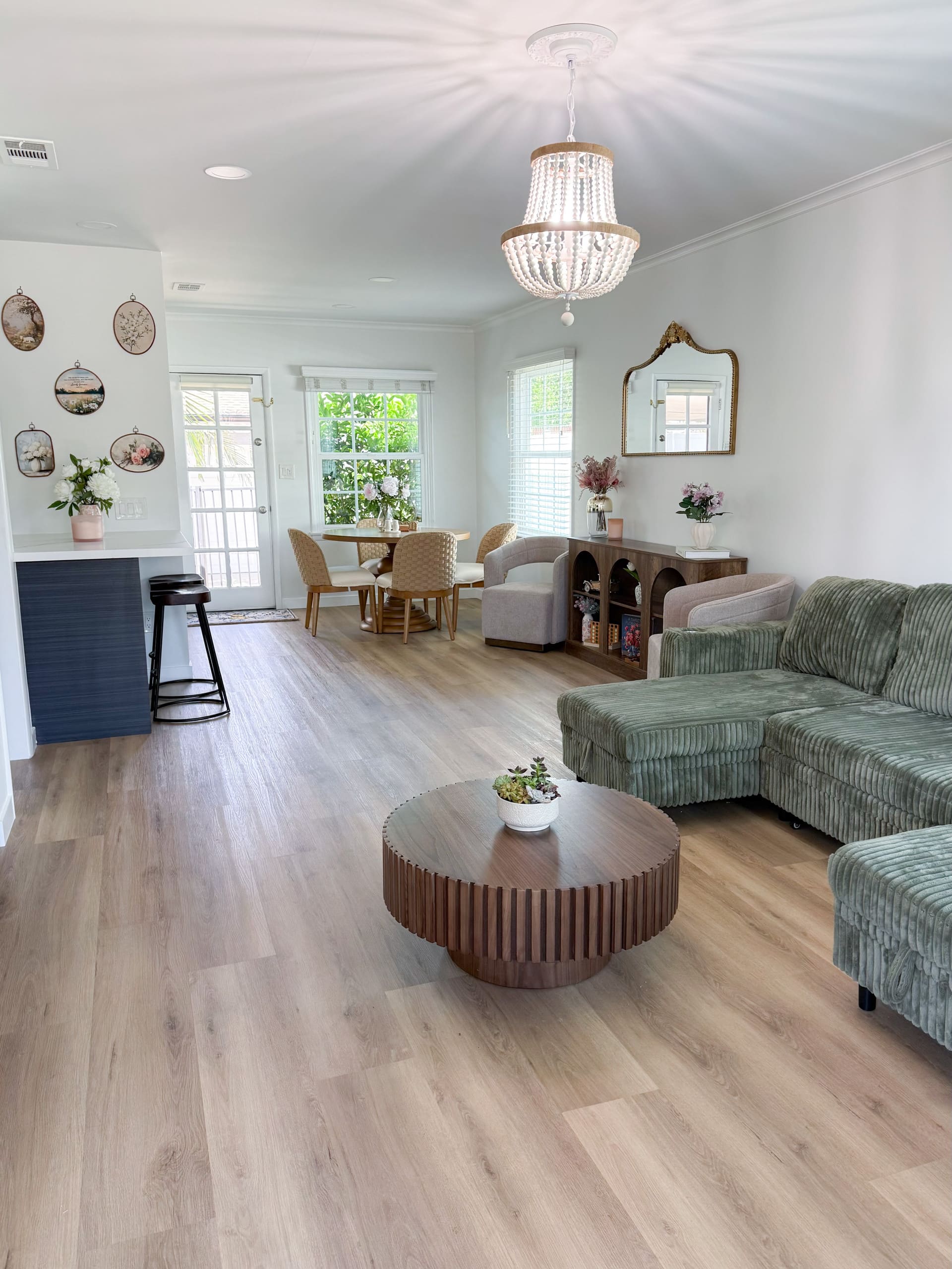 Open living and dining room with natural light